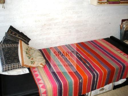 The bedroom at the house in Palermo