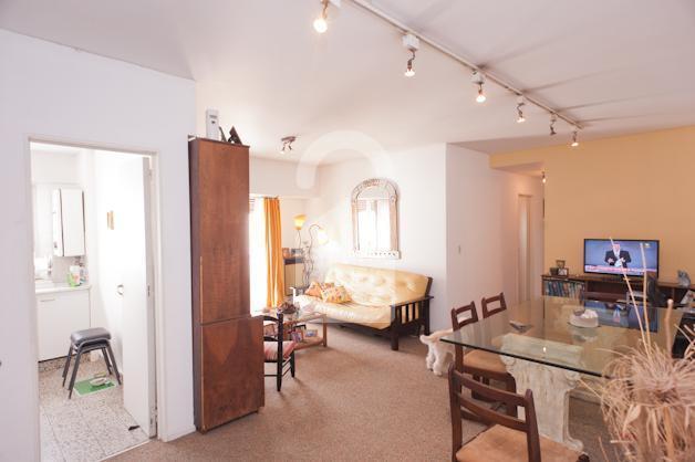 View from the entrance of the kitchen and the living room.