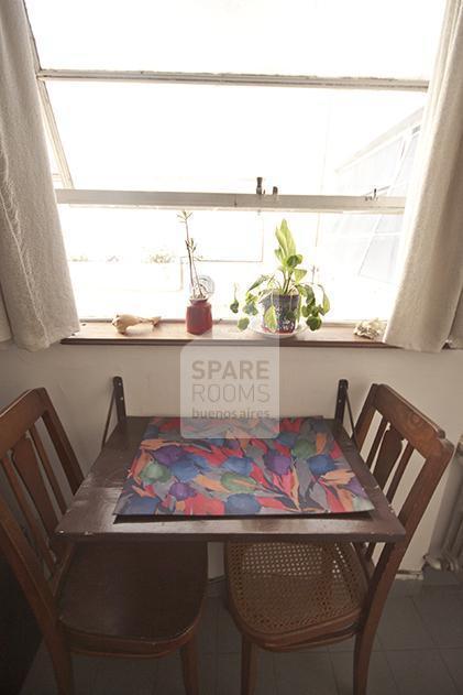 Table with two chairs in the room