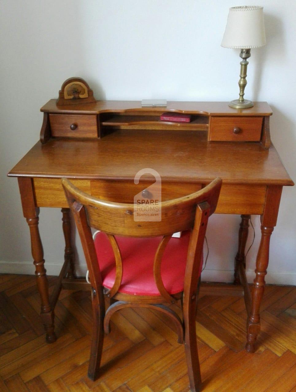 The desk in the bedroom